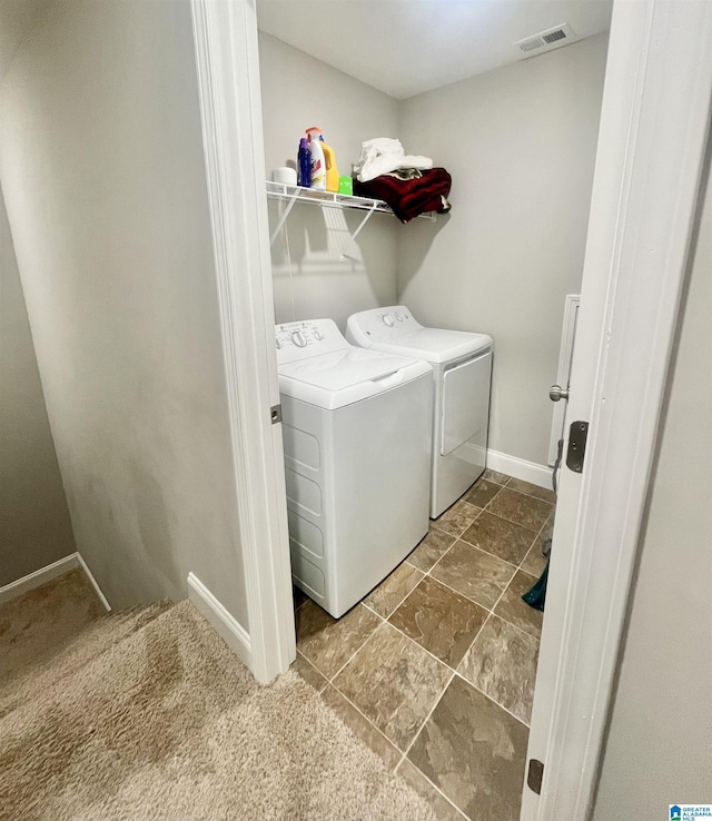 laundry area with washer and clothes dryer