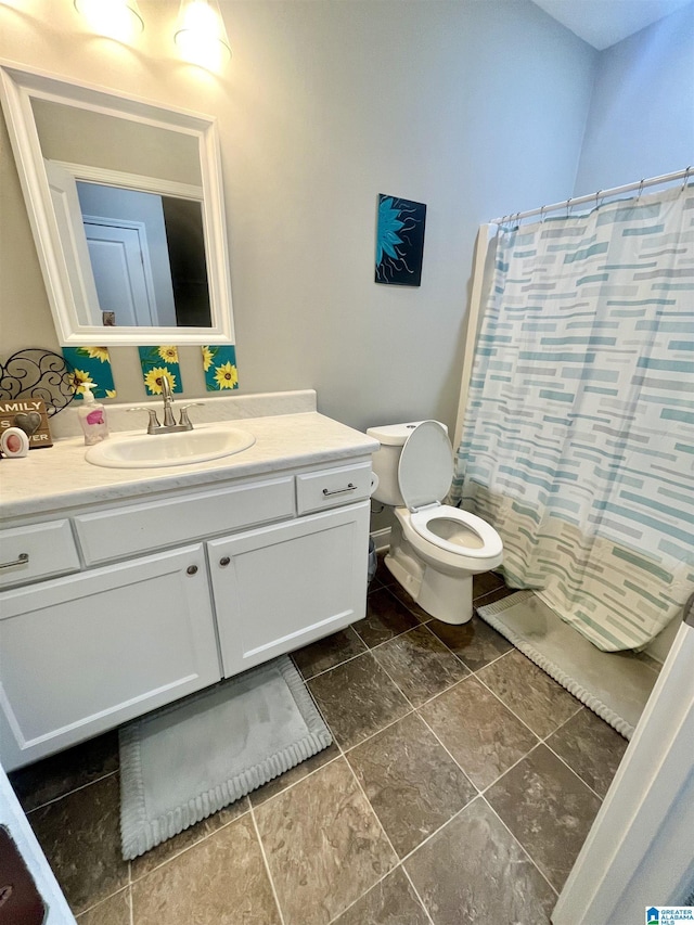 full bathroom with toilet, vanity, and shower / tub combo with curtain