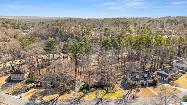 bird's eye view with a view of trees