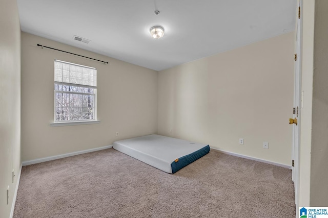 unfurnished bedroom with light carpet