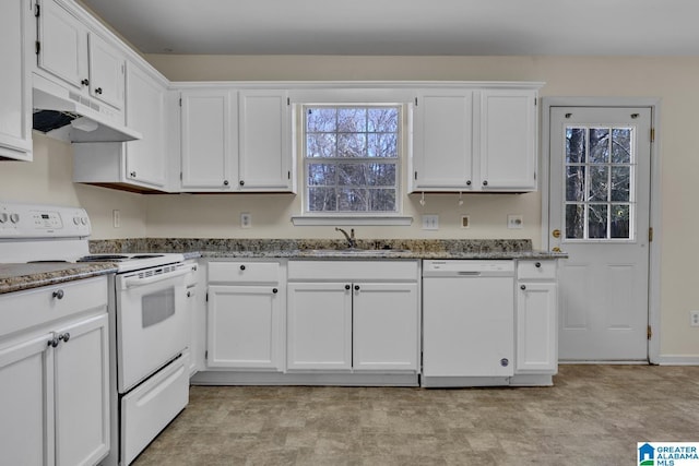 kitchen with sink, white cabinets, and white appliances