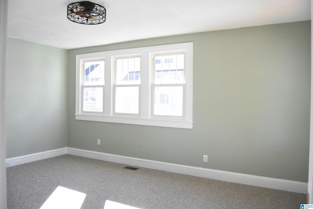 view of carpeted spare room