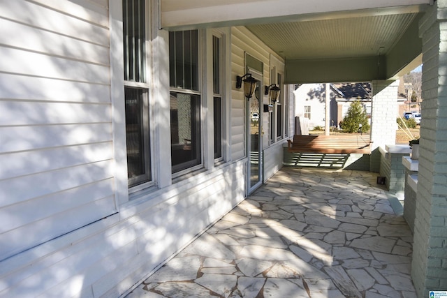 view of patio featuring covered porch