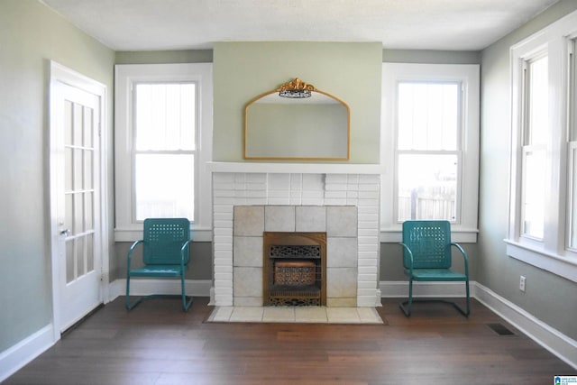 unfurnished room with hardwood / wood-style floors