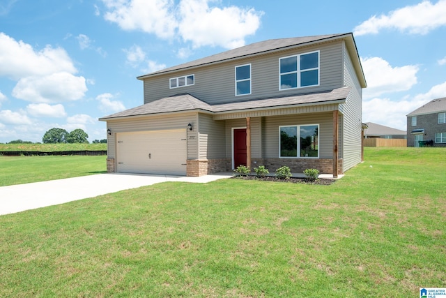 view of front of house with a front lawn and a garage