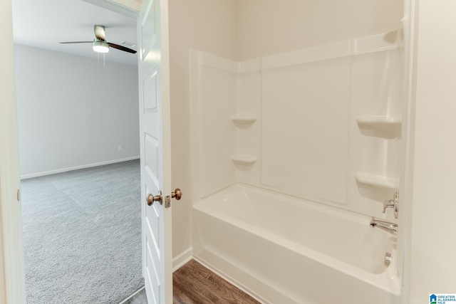 bathroom with ceiling fan and shower / bath combination