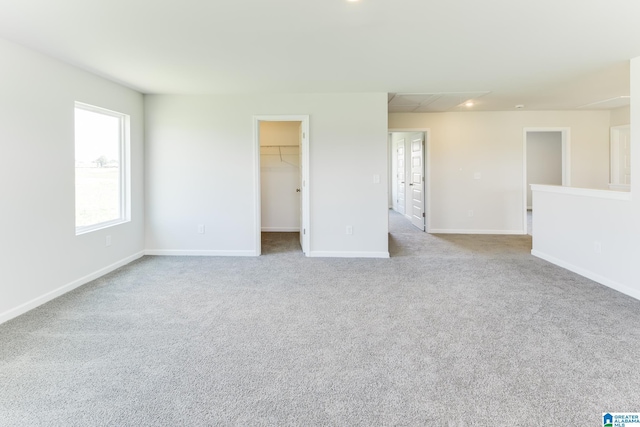 empty room featuring light colored carpet