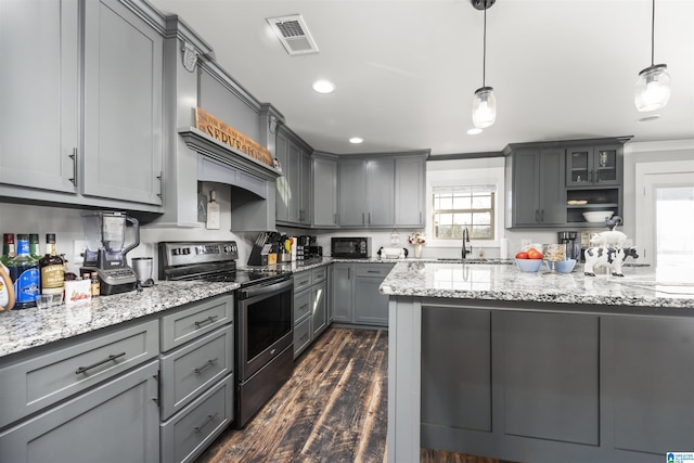 kitchen with stainless steel electric range, dark hardwood / wood-style flooring, gray cabinetry, and pendant lighting