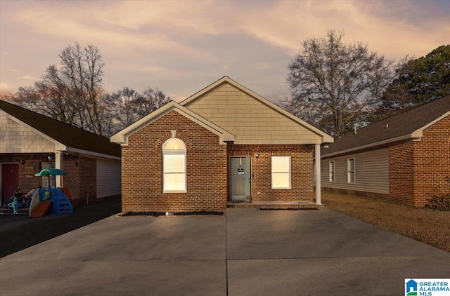 view of front facade with a patio area