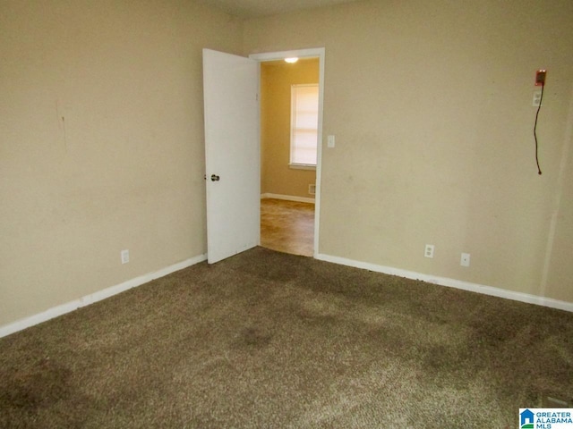 view of carpeted spare room