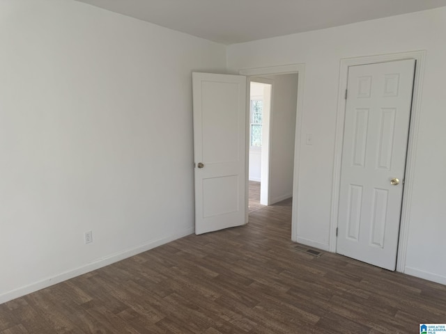 interior space with dark wood-type flooring