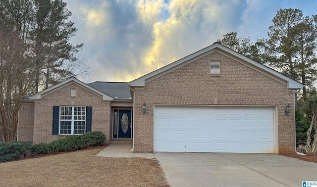 single story home with a garage