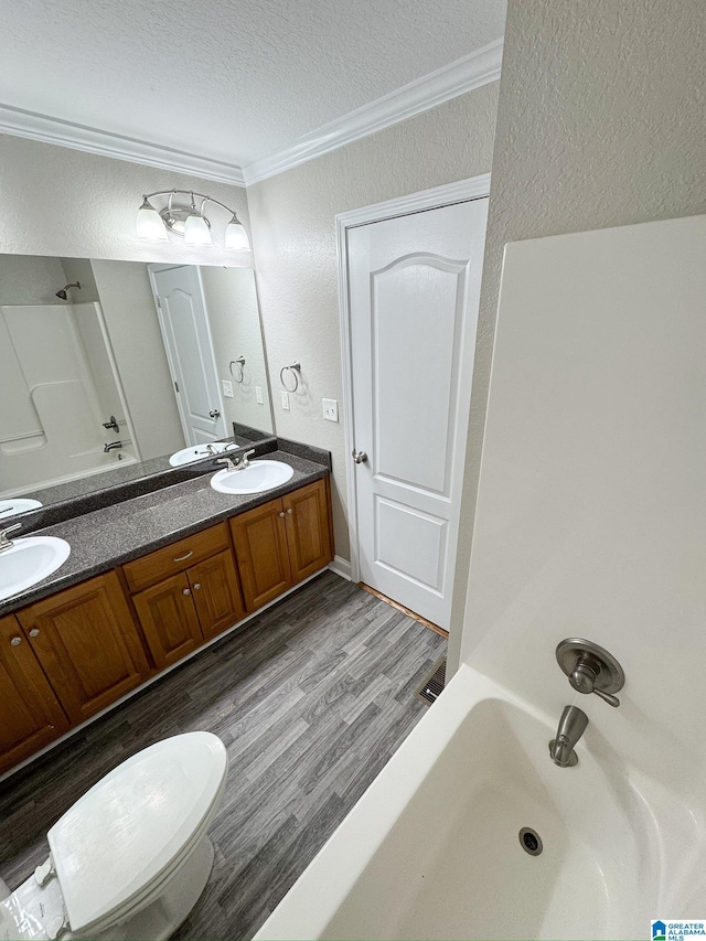 full bathroom with vanity, shower / bathtub combination, and ornamental molding