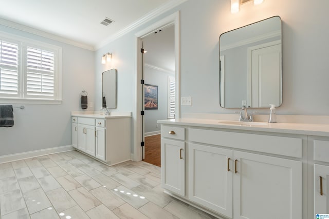 bathroom with vanity and crown molding