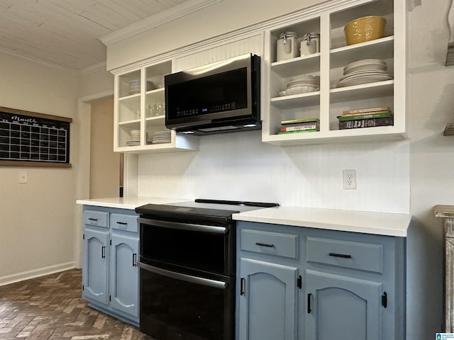 kitchen with ornamental molding, blue cabinets, and range with two ovens