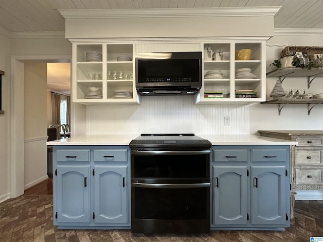 kitchen with double oven range, blue cabinetry, and ornamental molding