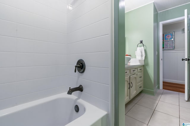 bathroom with vanity, tile patterned flooring, and bathing tub / shower combination