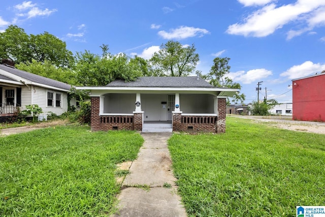 view of front of house featuring a porch and a front yard