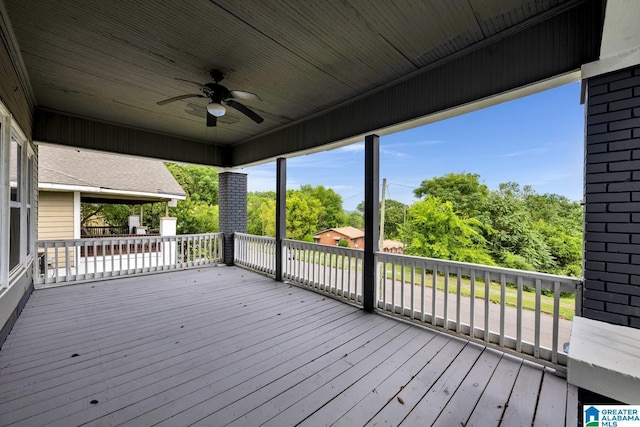 wooden terrace with ceiling fan