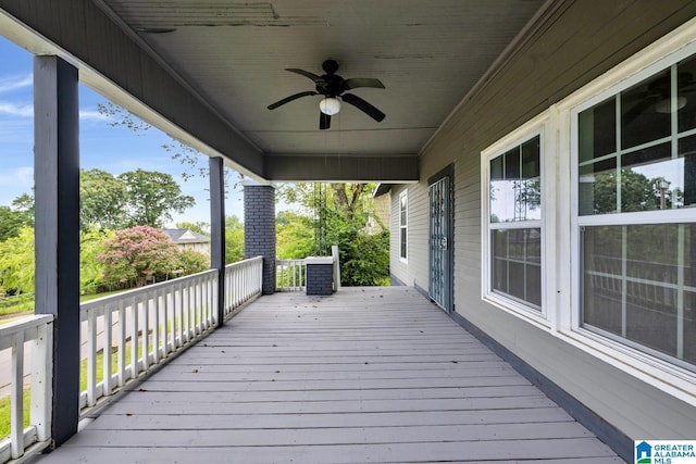 wooden terrace featuring ceiling fan and central air condition unit