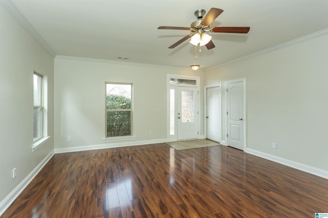 unfurnished room with ceiling fan, dark hardwood / wood-style flooring, and crown molding