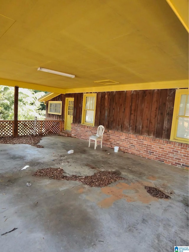 view of patio featuring fence