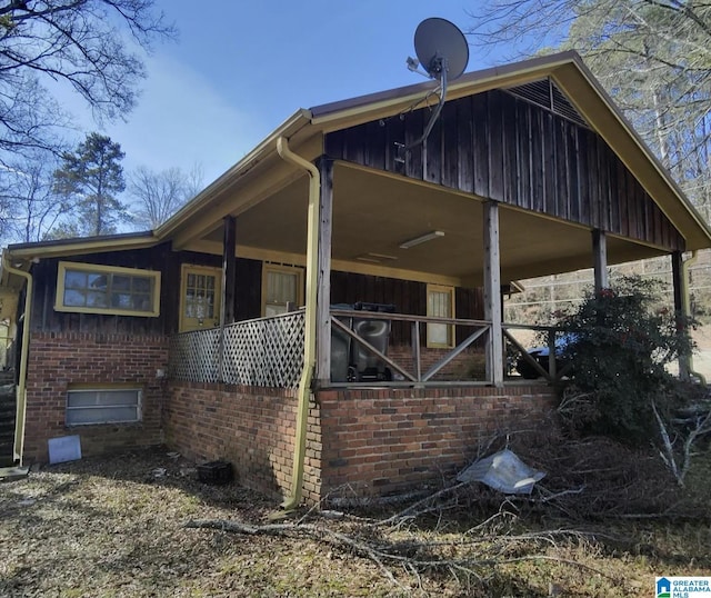 view of home's exterior featuring brick siding