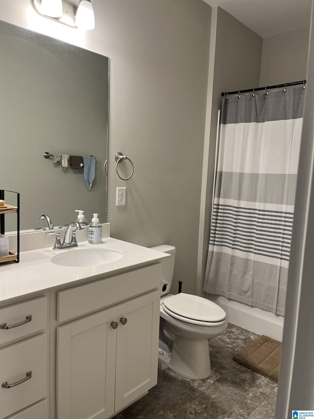 full bathroom with toilet, vanity, and shower / tub combo with curtain