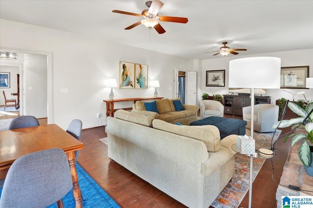 living room featuring dark wood-type flooring and ceiling fan