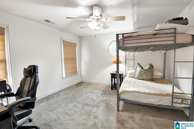 carpeted bedroom with ceiling fan