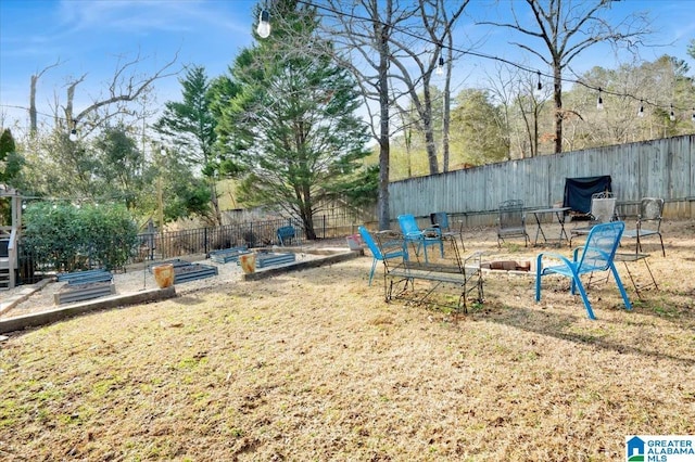 view of play area featuring a lawn