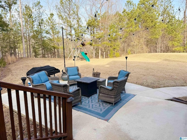 view of patio / terrace with outdoor lounge area and a playground