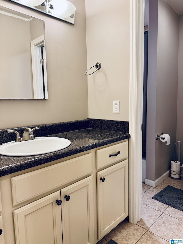 bathroom featuring vanity and tile patterned flooring