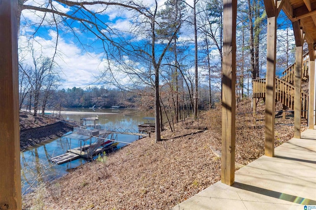 dock area with a water view