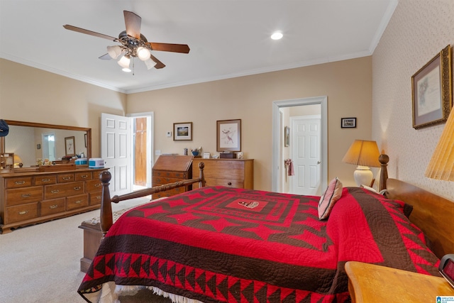 carpeted bedroom with ceiling fan and crown molding