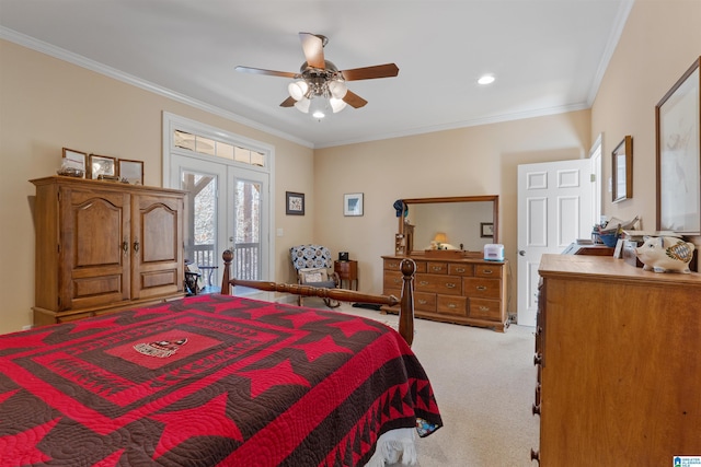 carpeted bedroom with ceiling fan, access to exterior, ornamental molding, and french doors