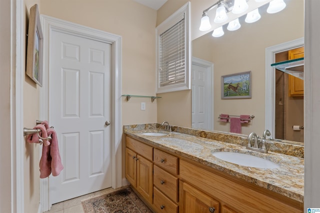 bathroom featuring vanity and tile patterned flooring