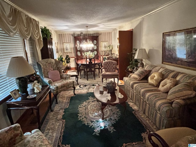 living room with a chandelier, wood walls, crown molding, and a textured ceiling