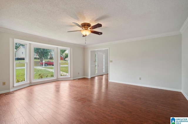 unfurnished room with a textured ceiling, ceiling fan, crown molding, and hardwood / wood-style floors