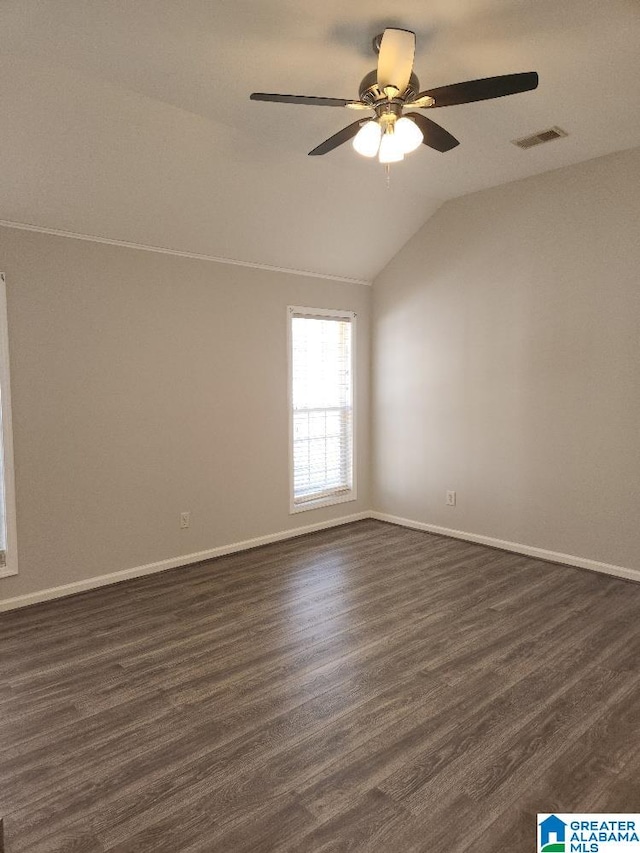 spare room with vaulted ceiling and ceiling fan