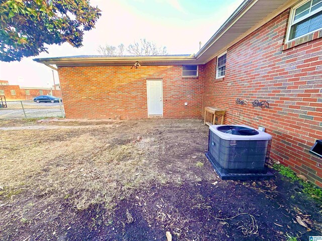 back of property with central AC unit