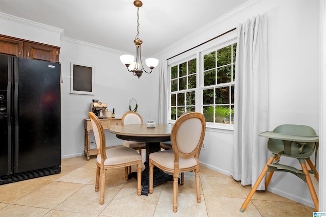 dining space with plenty of natural light, ornamental molding, and an inviting chandelier