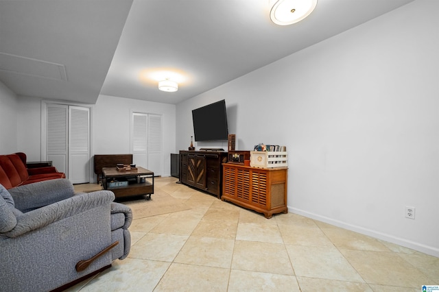 living room with light tile patterned floors