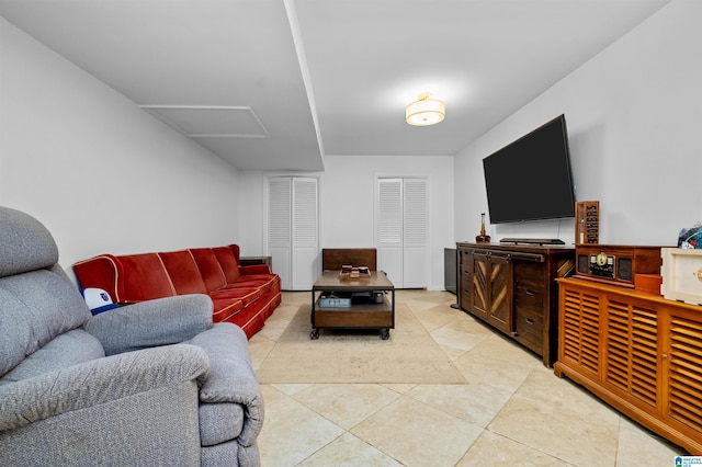 living room with light tile patterned flooring