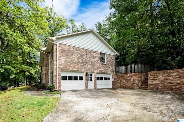 view of property exterior with a garage