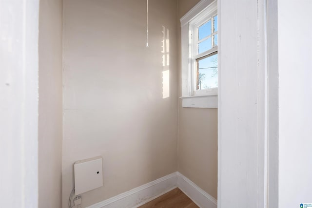 laundry room featuring hardwood / wood-style floors