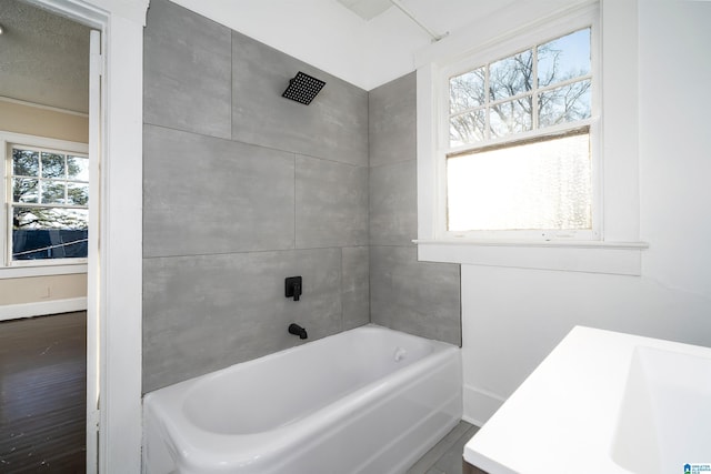 bathroom with bathtub / shower combination