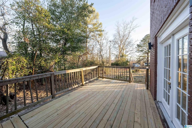 wooden terrace featuring french doors