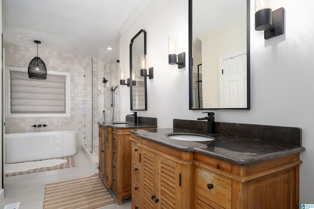 bathroom featuring independent shower and bath, ornamental molding, tile patterned floors, and vanity