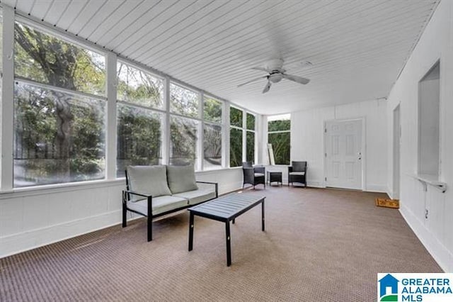 sunroom with ceiling fan